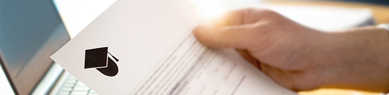 Person looking at laptop with content in a document