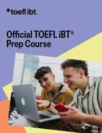 A college-aged woman studies on her laptop